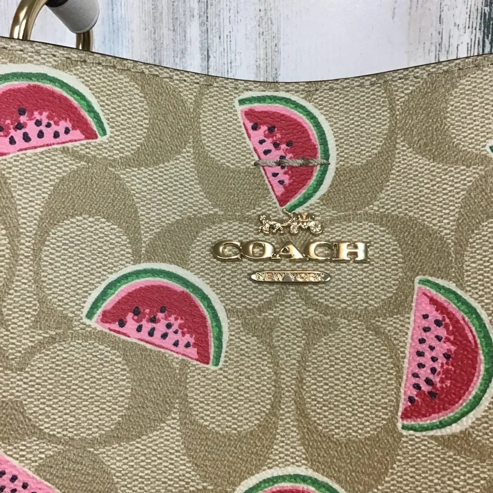 Coach Small Town Bucket Bag in Signature Canvas with a watermelon print. EUC - Picture 3 of 16